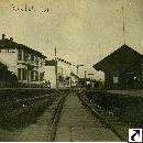 View down railroad tracks toward Union Hotel and station