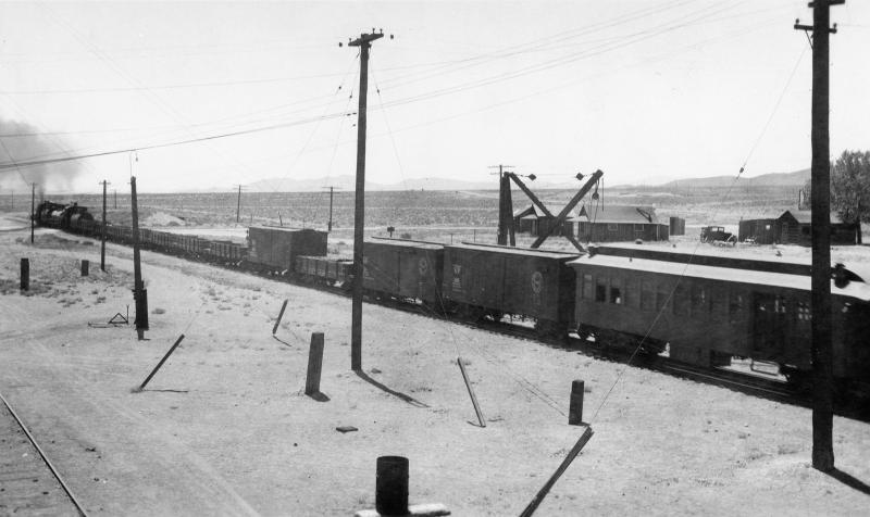 A westbound train leaves the south end of Mina in 1937.