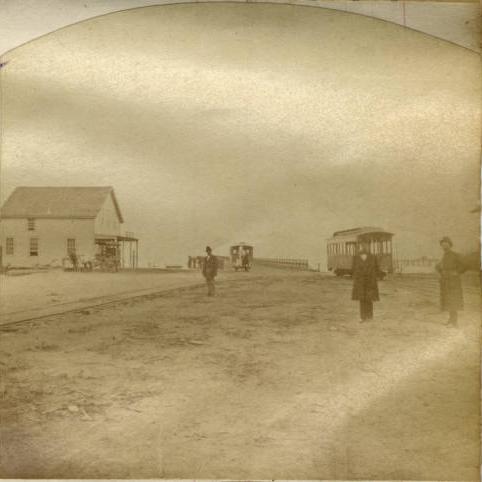 Santa Cruz Wharf showing horse car and SC&F coach.