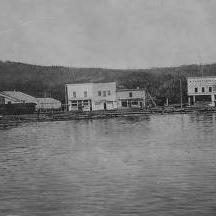 Buildings and railroad car in Chena, seen from Tanana River, Alaska, 1914