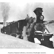 Locomotive and train in snow, Tanana Valley Railroad, n.d.